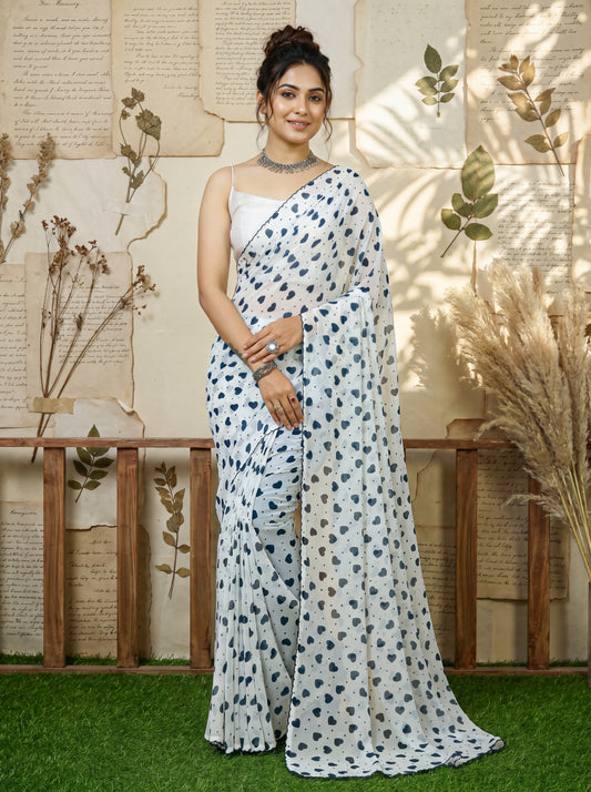 Saranya White Ethnic Motif Georgette Saree with Embroidered Border & White Blouse Piece
