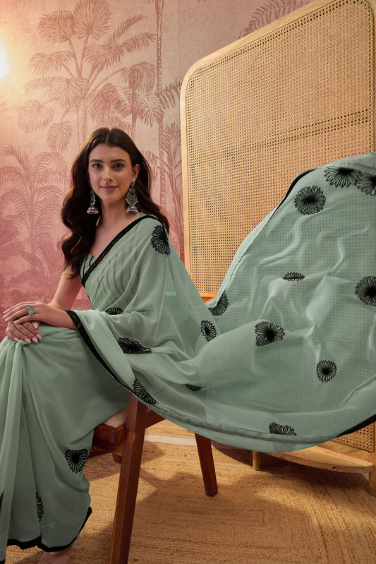 Dakshayani Mint Green Embellished Georgette Saree with Embellished Border & Mint Green Blouse Piece