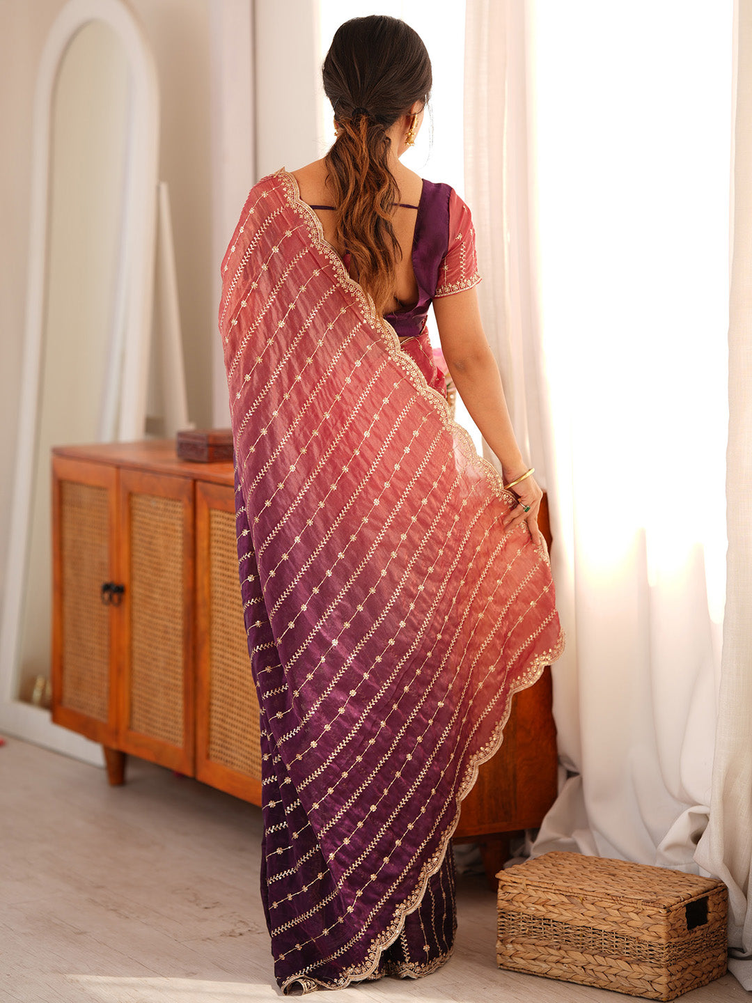 anniversary saree collection
traditional saree collection
Elegant wine and purple dual-tone combination saree