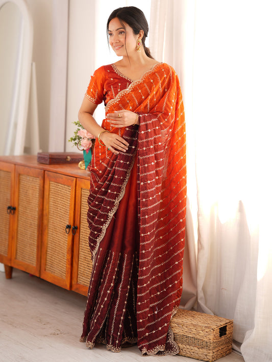 Attractive Orange & Maroon Dual-Tone Combination
Rich Embroidered Zari Work saree
Traditional Yet Stylish Look saree