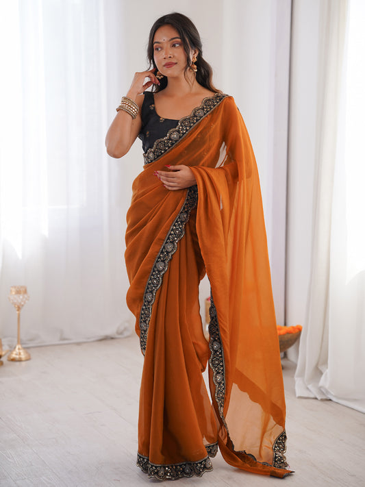 Rust Orange Georgette Saree with Embroidered Border & Black Blouse