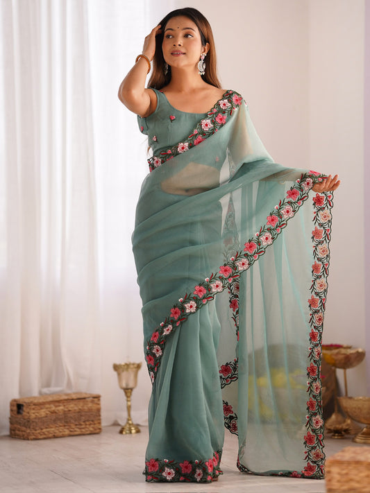 Teal Organza Saree with Floral Embroidery Border & Blouse Piece