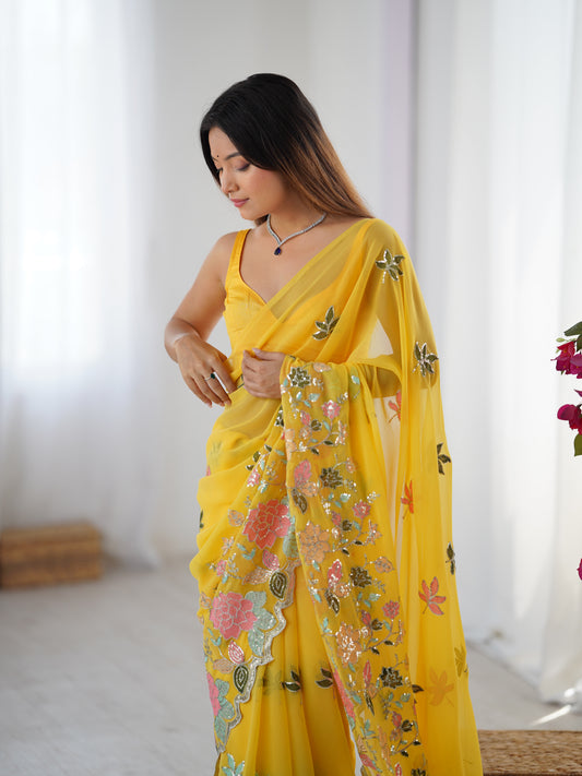 Kesari Yellow Georgette Embroidered Saree