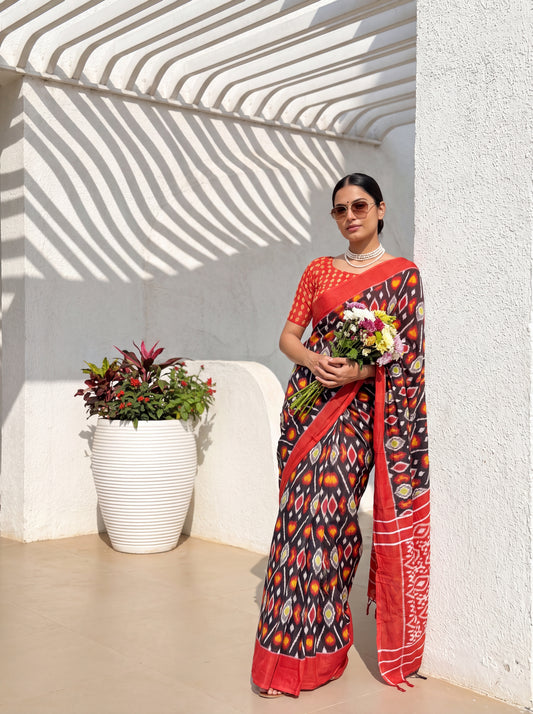 Prabhavati Black Ikat Cotton Saree with Solid Border & Red Blouse Piece