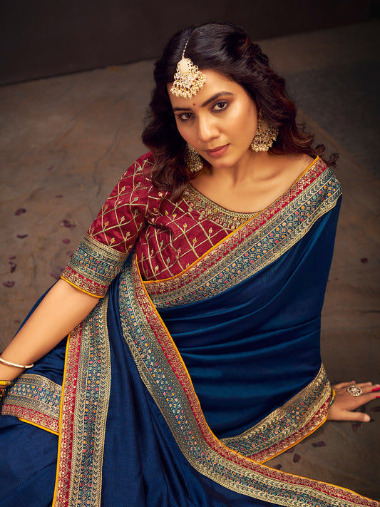 Teal Blue Silk Saree with Maroon Embroidered Blouse