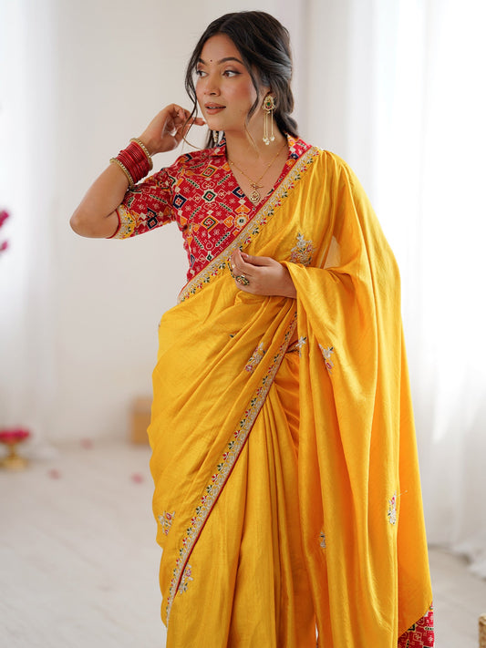 Yellow Embroidered  Satin  Saree with Patola Print Blouse