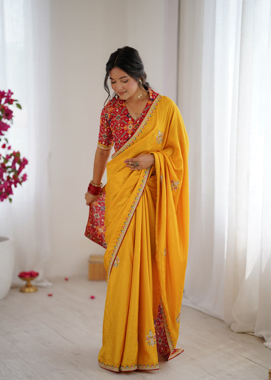 Yellow Embroidered Saree with Patola Print Blouse