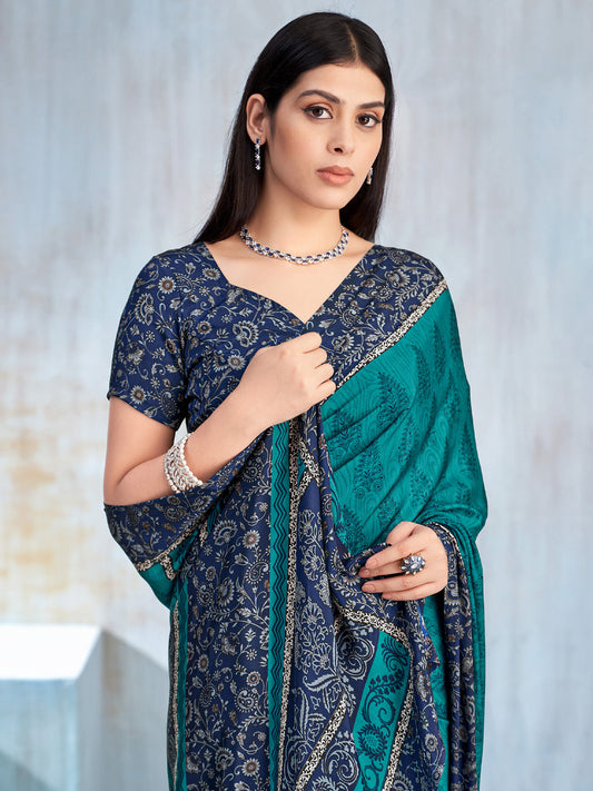Teal & Navy Two-Tone Silk Saree with Self-Tone Jacquard Floral Weave, All-Over Silver Floral Vine Print, Multi-Stripe Printed Pallu, Gold Sequin Lace Trim & Matching Navy Printed Blouse