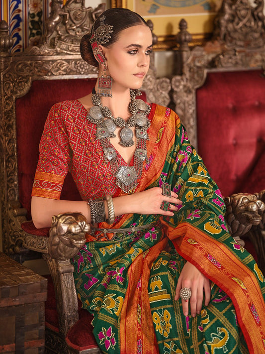 Dark Green Silk Blend Patola Inspired Weaving Zari Border Blouse Saree - Ressa