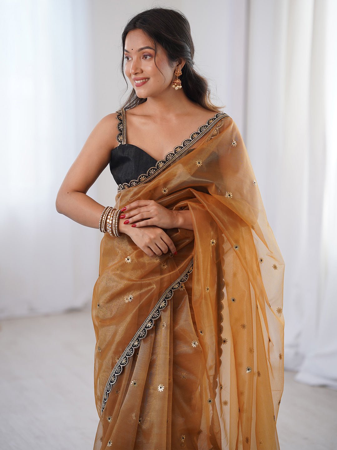 Golden Organza Saree with Sequin Embroidery & Black Border - Ressa