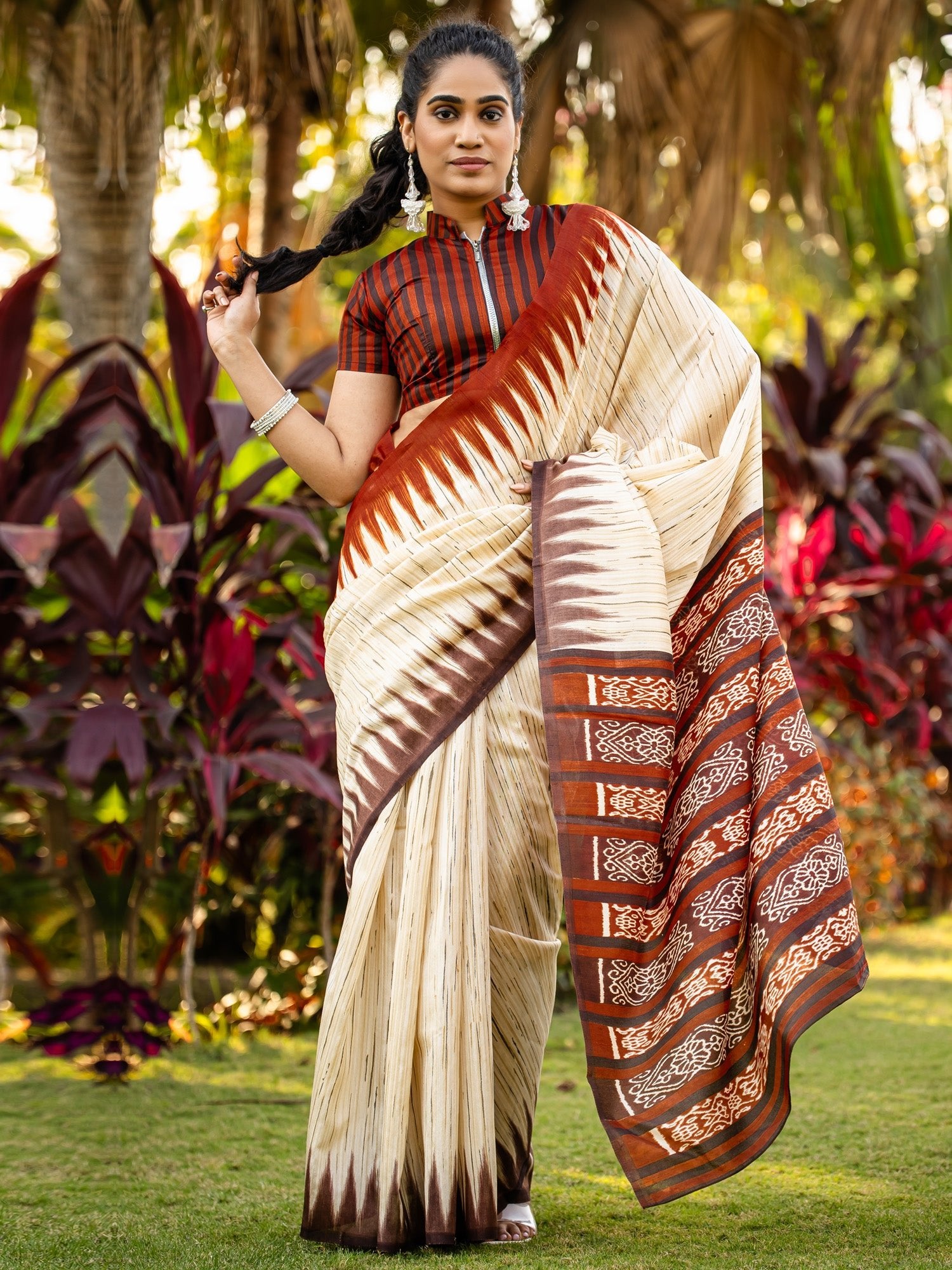 Ivory Chennaipattu Silk Saree with Gold Stripe Body, Feathered Ikat Maroon Border, Diamond Medallion Pallu & Stripe Zip Blouse - Ressa