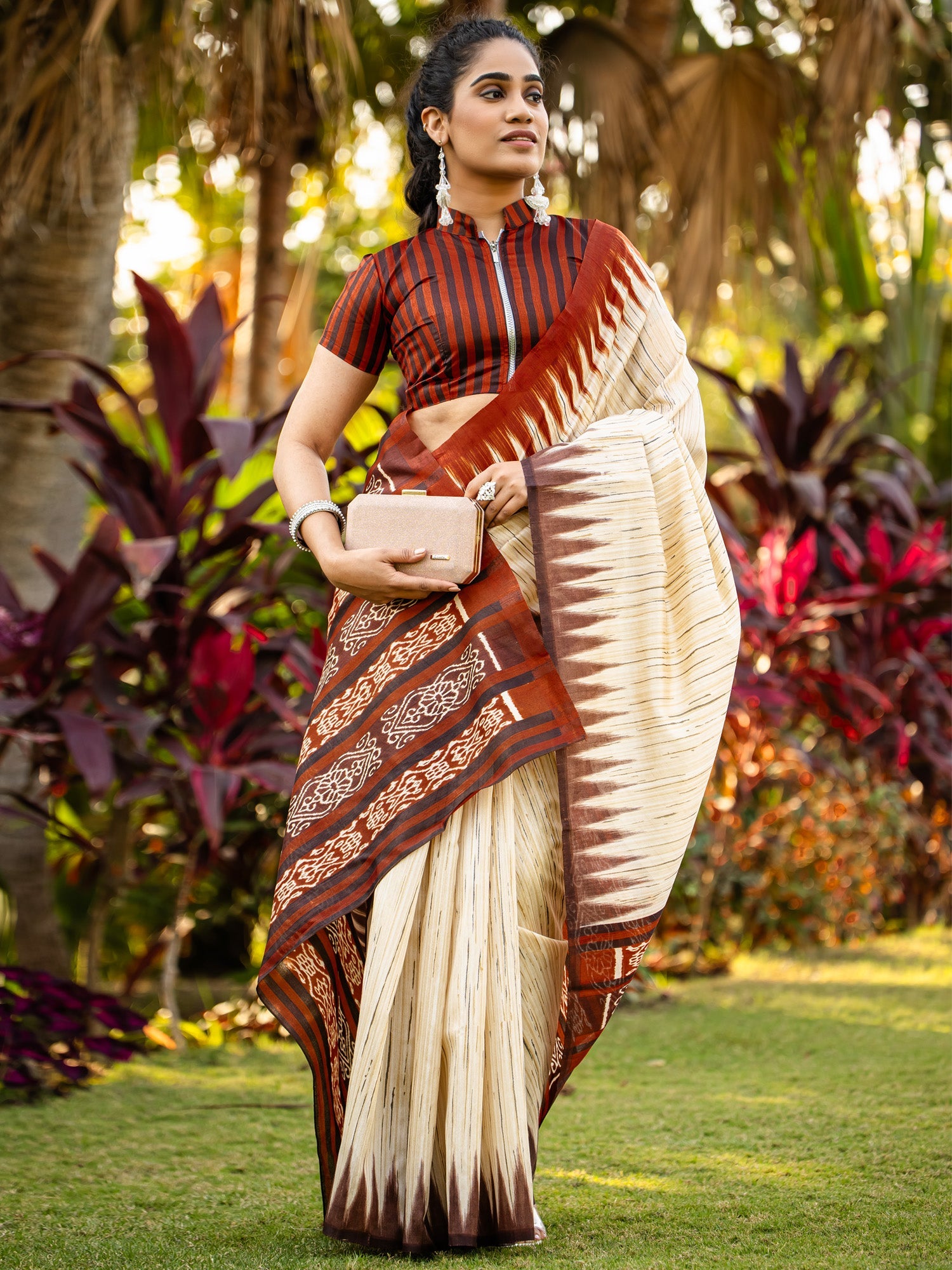 Ivory Chennaipattu Silk Saree with Gold Stripe Body, Feathered Ikat Maroon Border, Diamond Medallion Pallu & Stripe Zip Blouse - Ressa