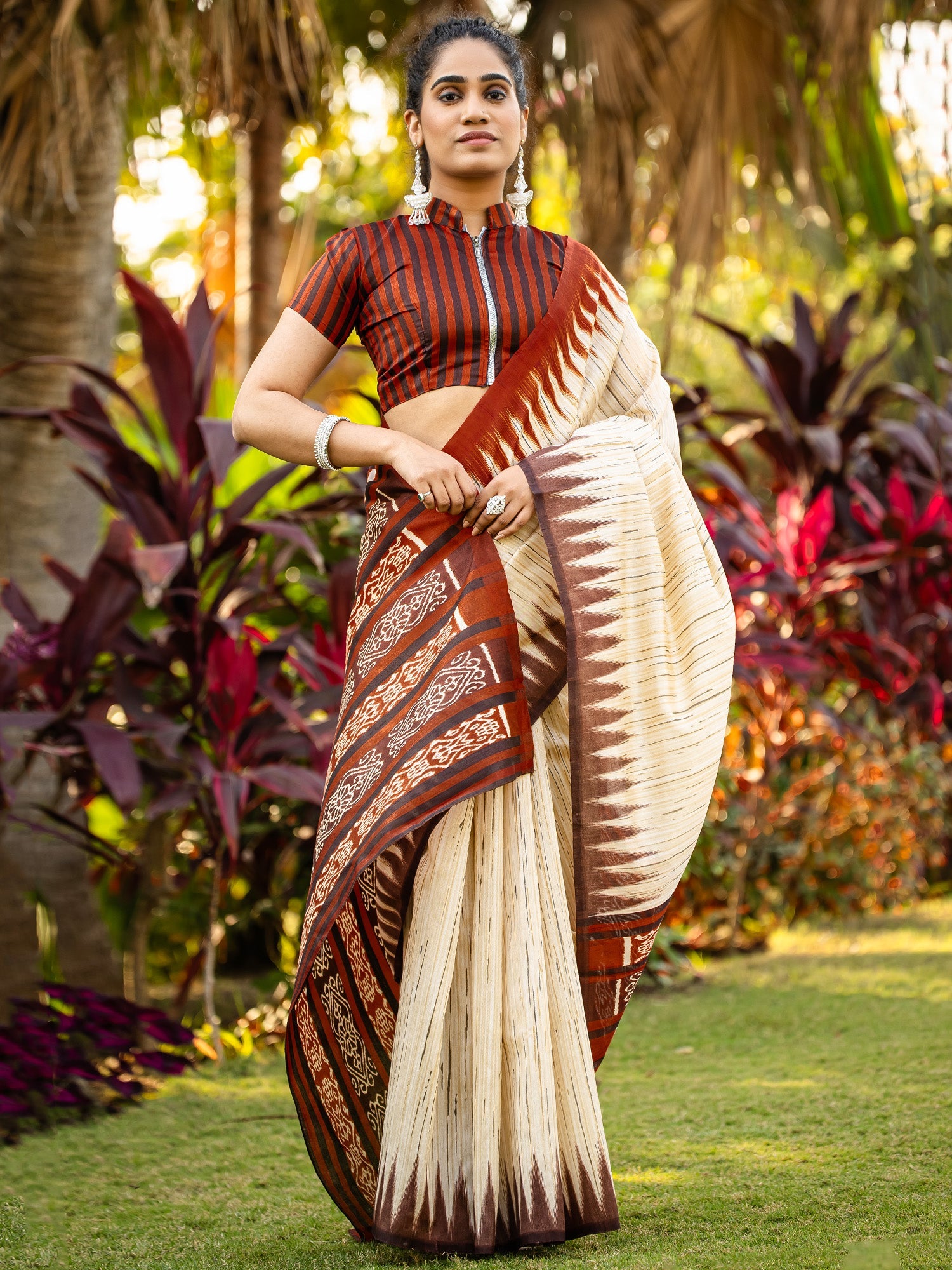 Ivory Chennaipattu Silk Saree with Gold Stripe Body, Feathered Ikat Maroon Border, Diamond Medallion Pallu & Stripe Zip Blouse - Ressa