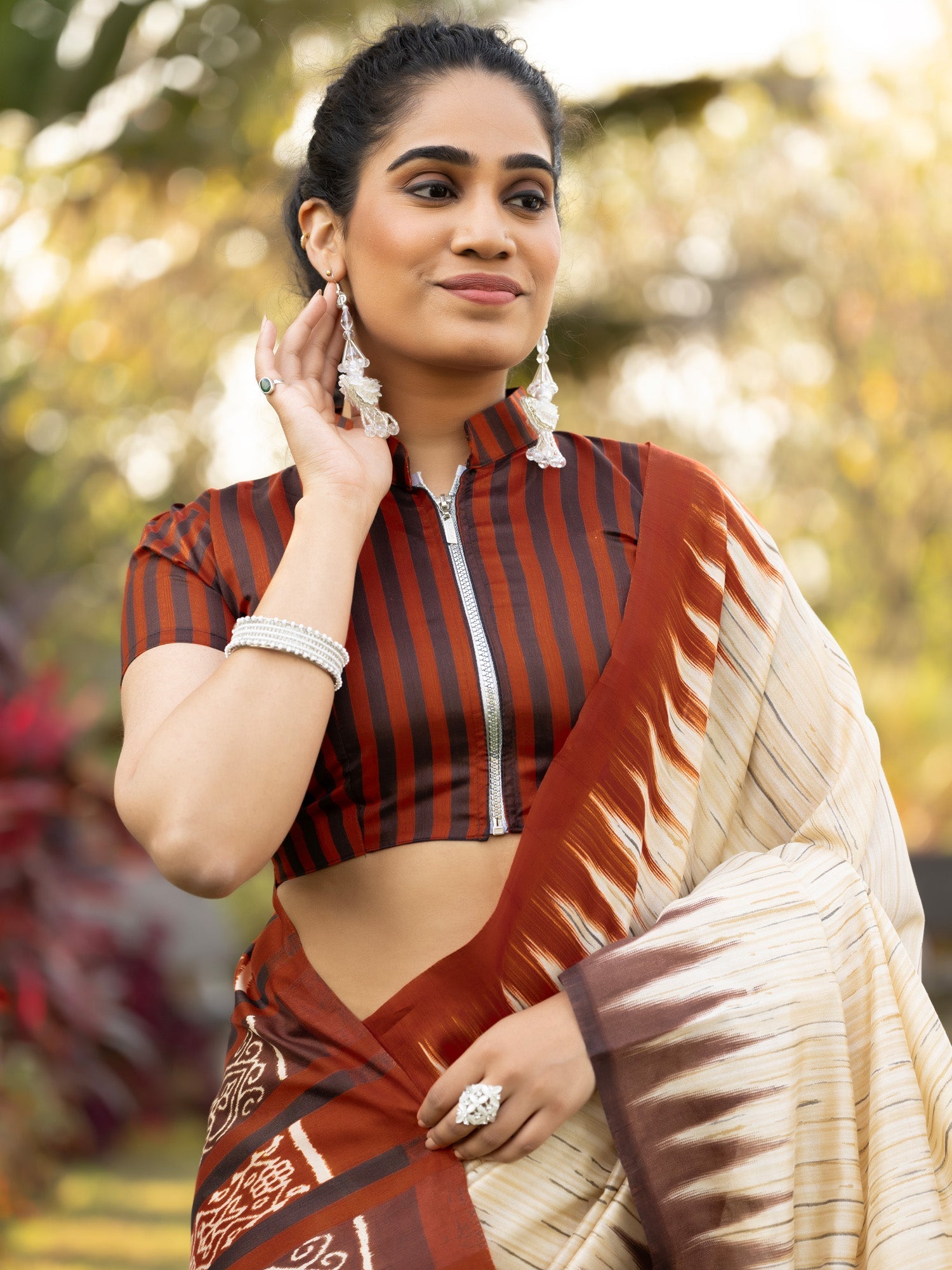 Ivory Chennaipattu Silk Saree with Gold Stripe Body, Feathered Ikat Maroon Border, Diamond Medallion Pallu & Stripe Zip Blouse - Ressa