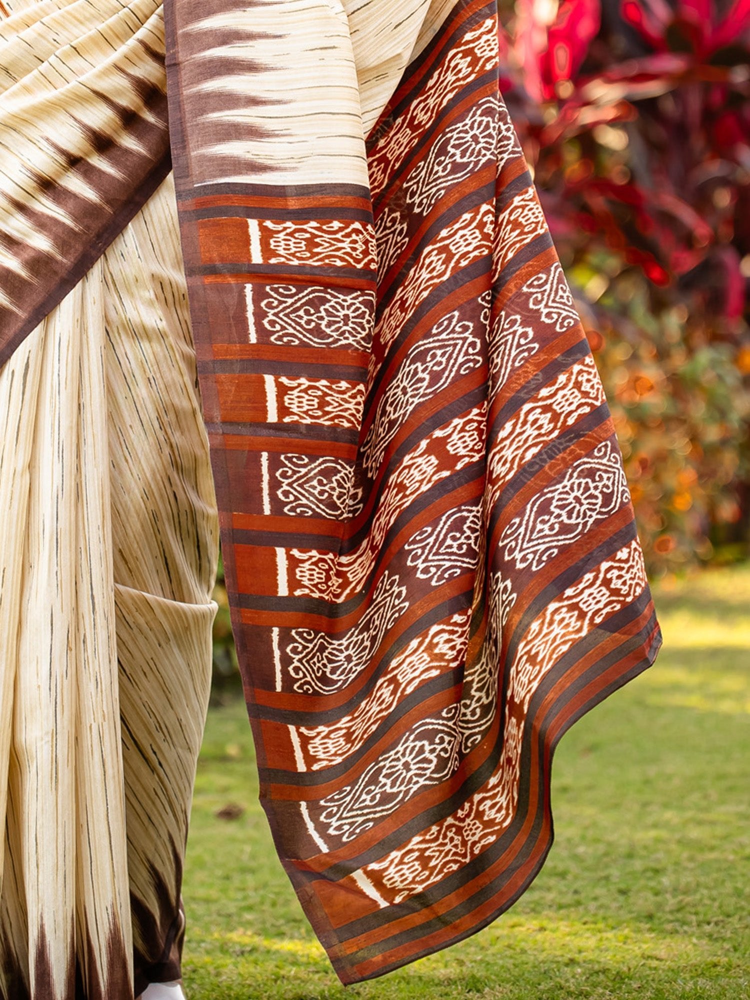Ivory Chennaipattu Silk Saree with Gold Stripe Body, Feathered Ikat Maroon Border, Diamond Medallion Pallu & Stripe Zip Blouse - Ressa