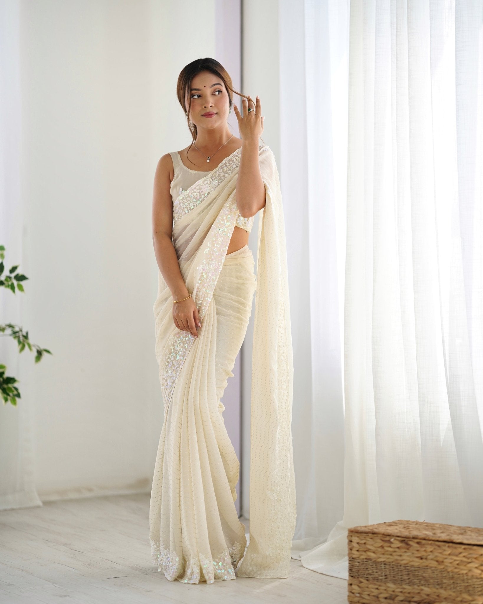Ivory Sequin Georgette Saree with Embroidered Border - Ressa