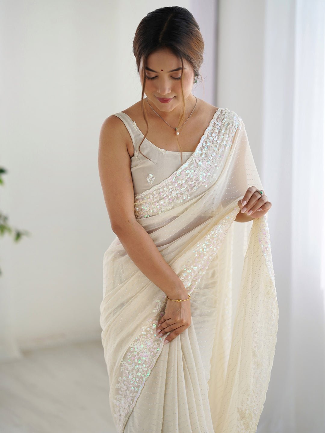 Ivory Sequin Georgette Saree with Embroidered Border - Ressa