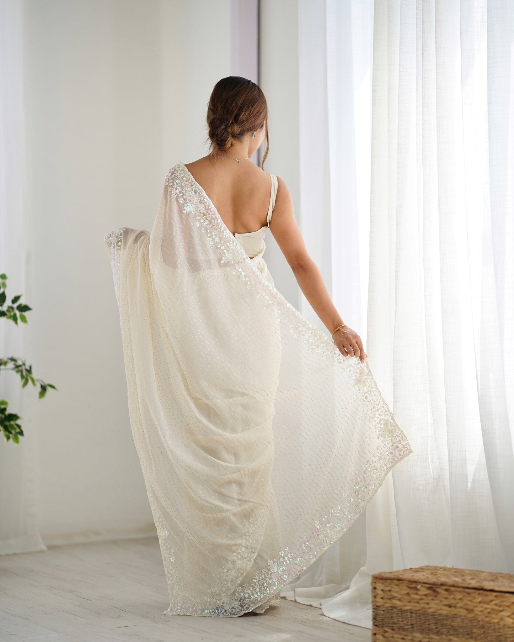 Ivory Sequin Georgette Saree with Embroidered Border - Ressa