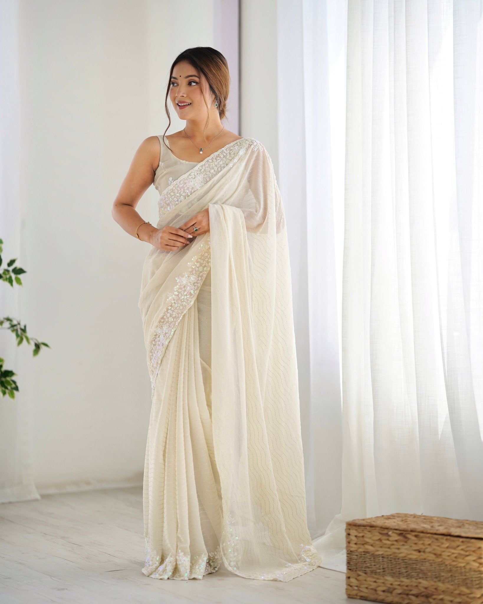 Ivory Sequin Georgette Saree with Embroidered Border - Ressa