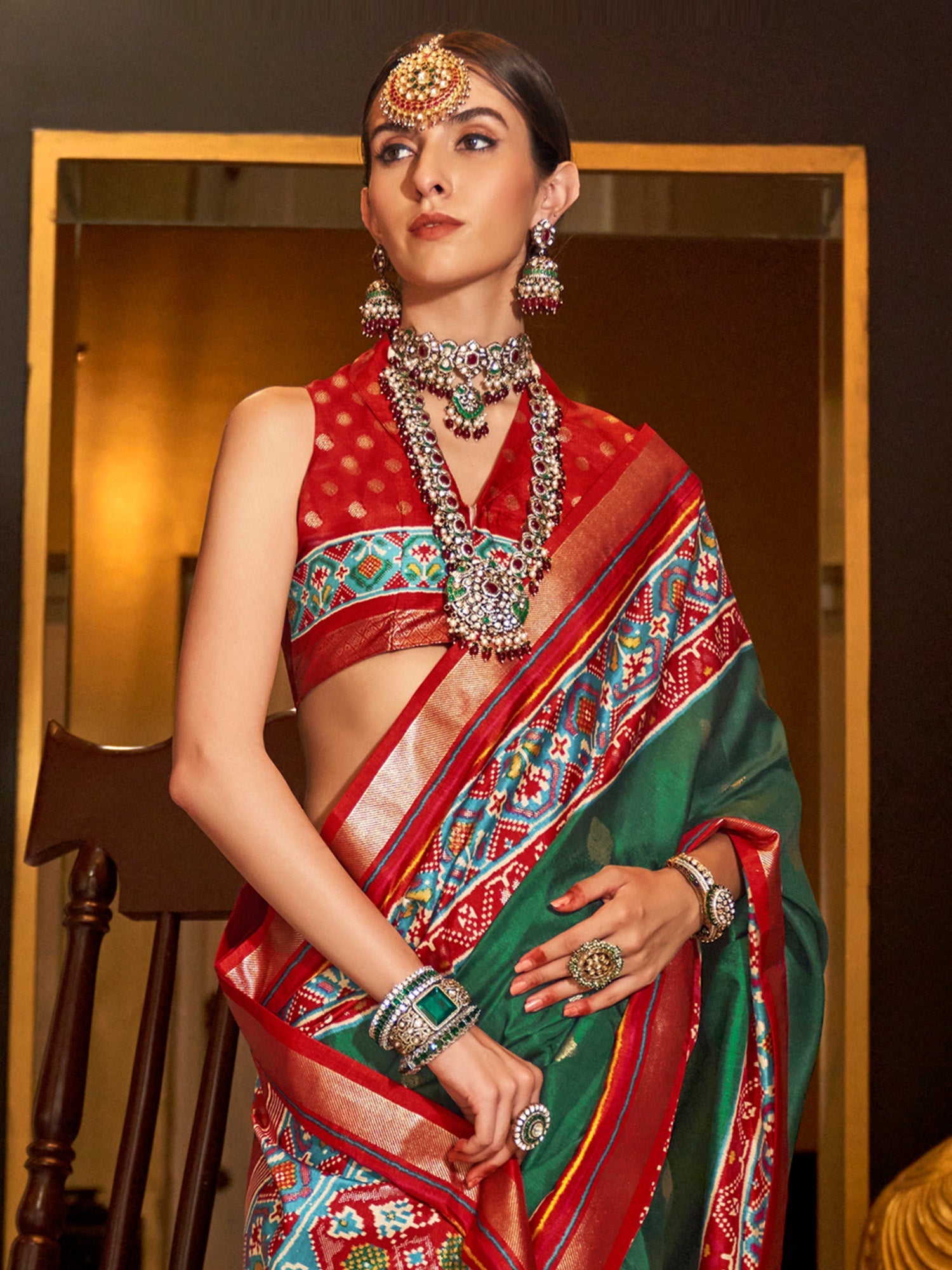 Patola Silk Saree in Bottle Green & Red with Patola Border - Ressa
