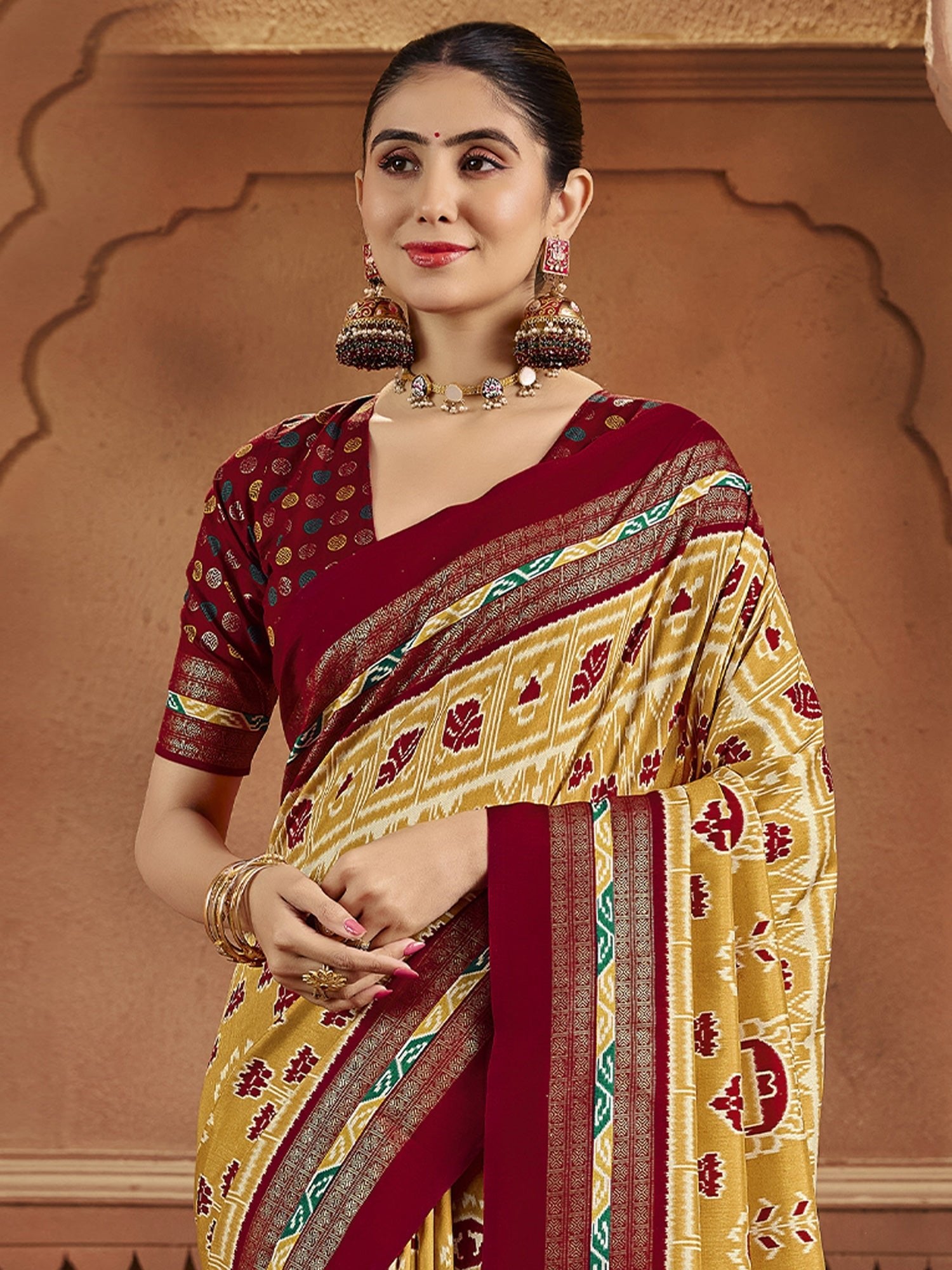 Patola Silk Saree in Yellow & Maroon with Ikat Weave - Ressa