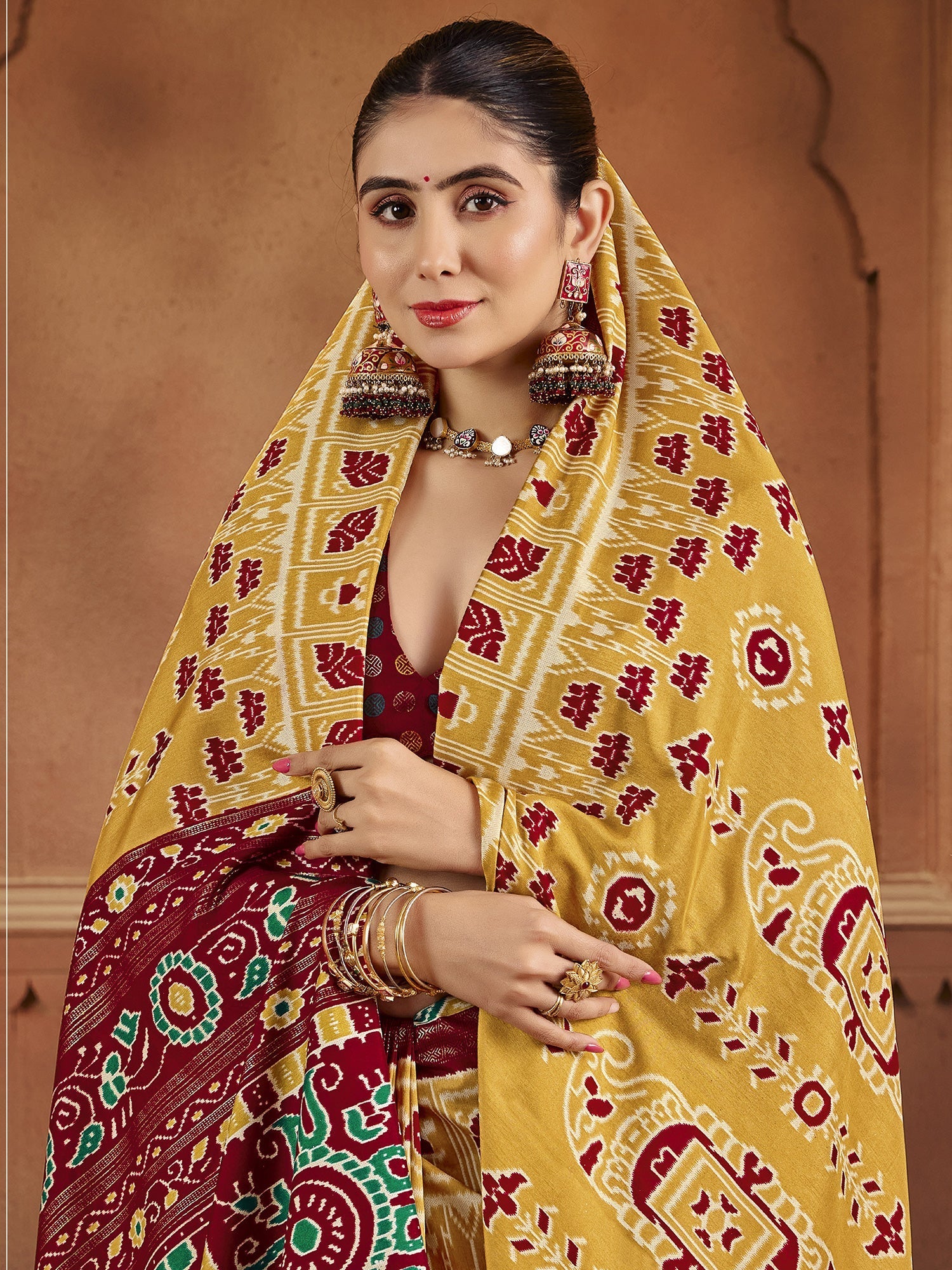 Patola Silk Saree in Yellow & Maroon with Ikat Weave - Ressa