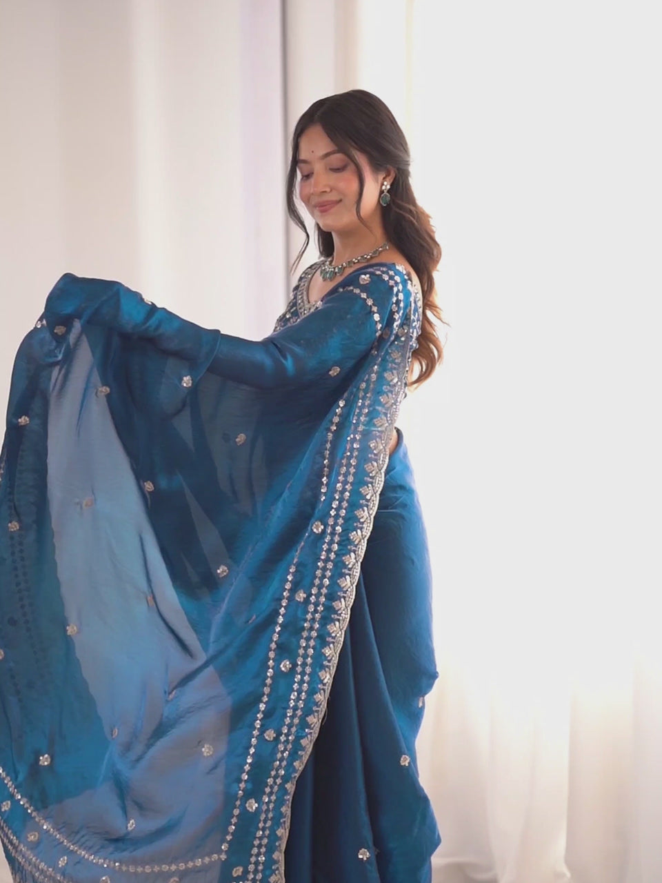 Teal Blue Satin Emblihsed Party Wear Saree