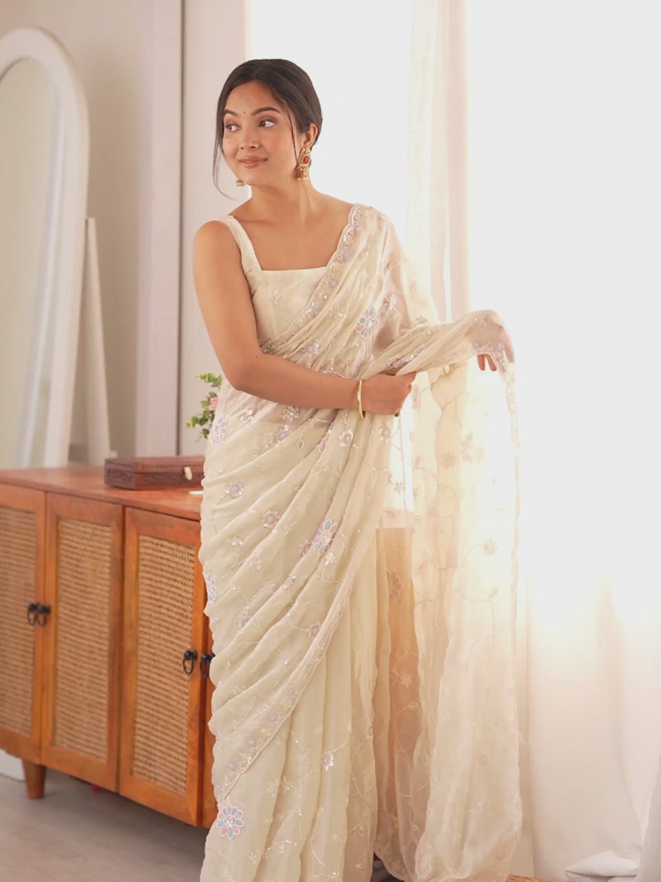 Offwhite satin saree with embllished design