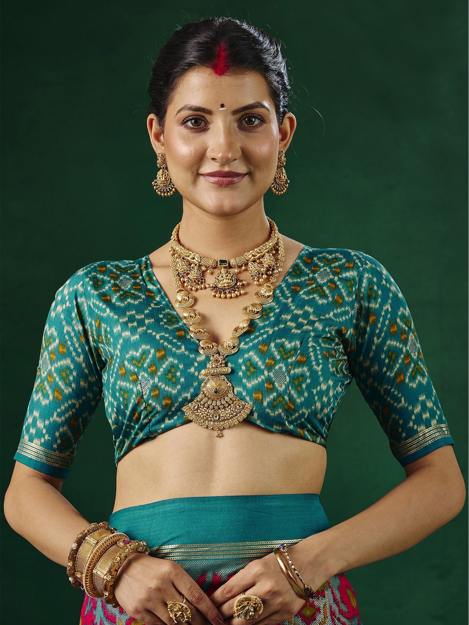 Rani Pink Patola Silk Saree with Teal Ikat Border - Ressa