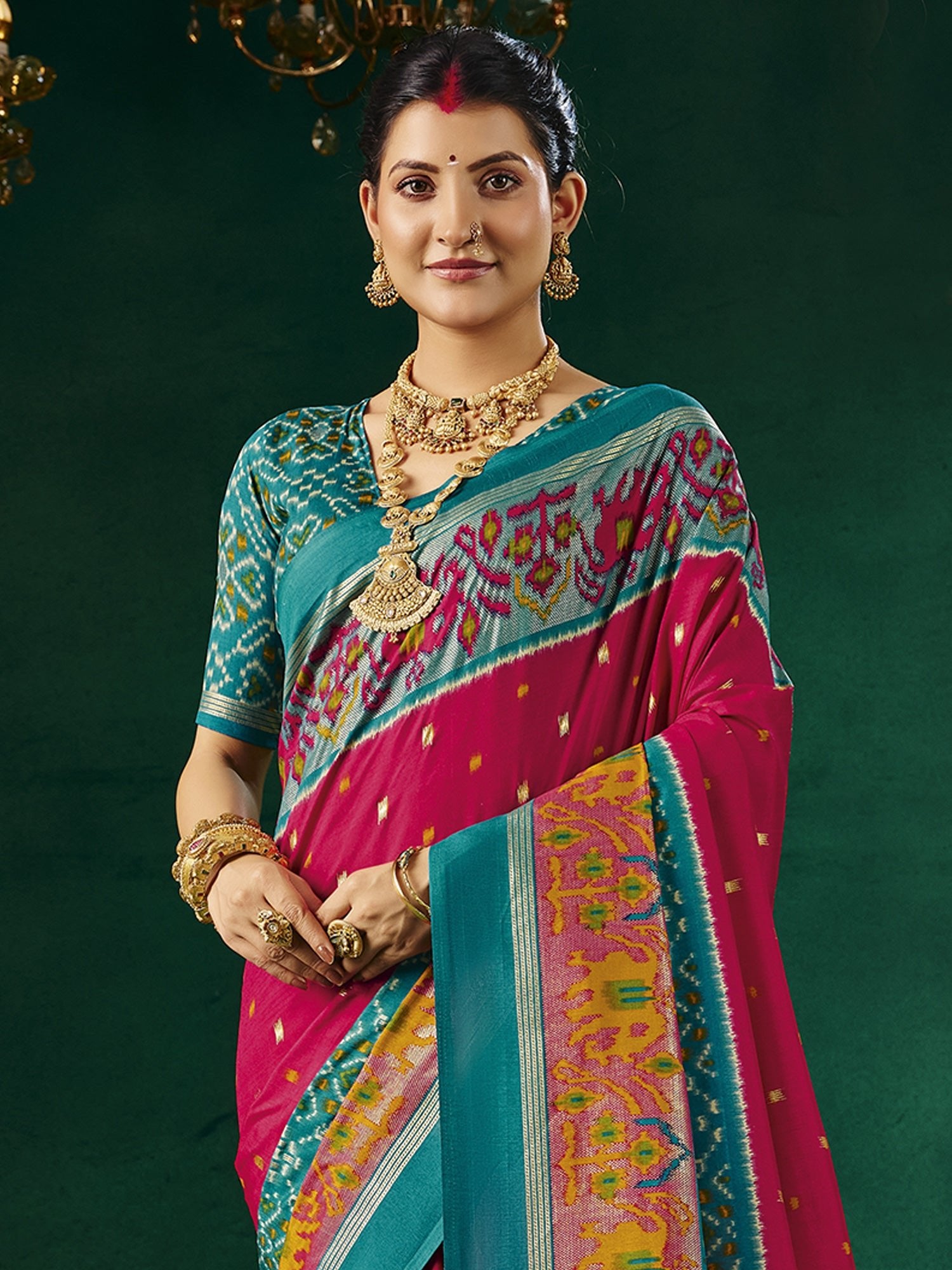Rani Pink Patola Silk Saree with Teal Ikat Border - Ressa