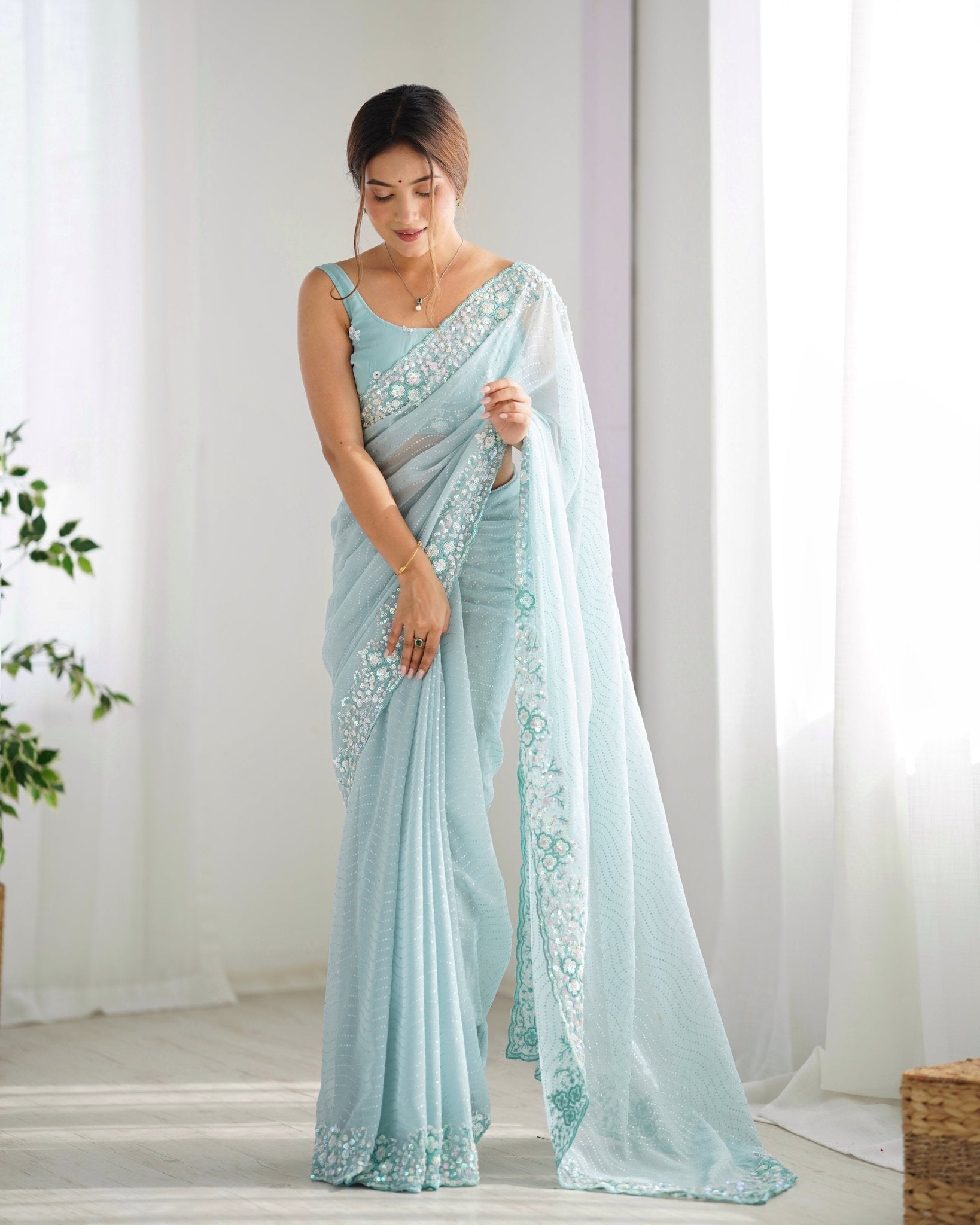 Sky Blue Georgette Embroidered Saree - Ressa