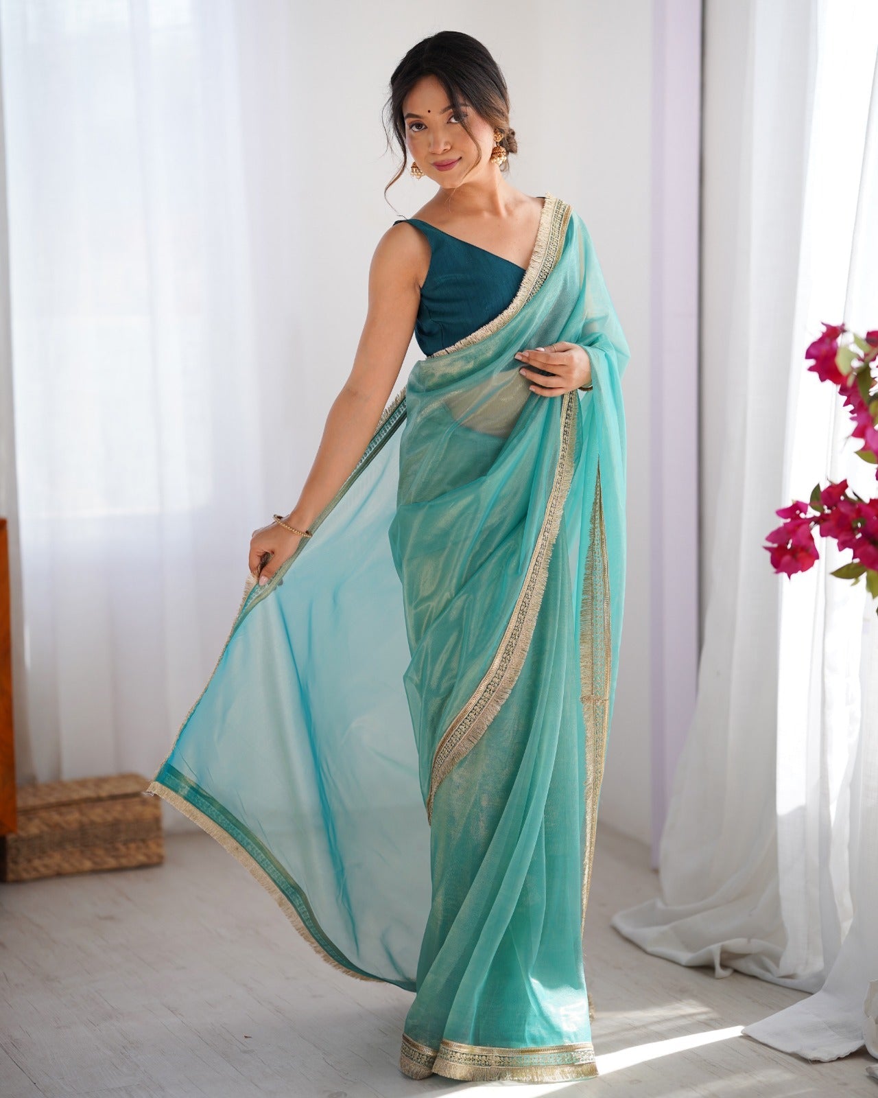 Sky Blue Solid Net Saree with Scalloped Border - Ressa