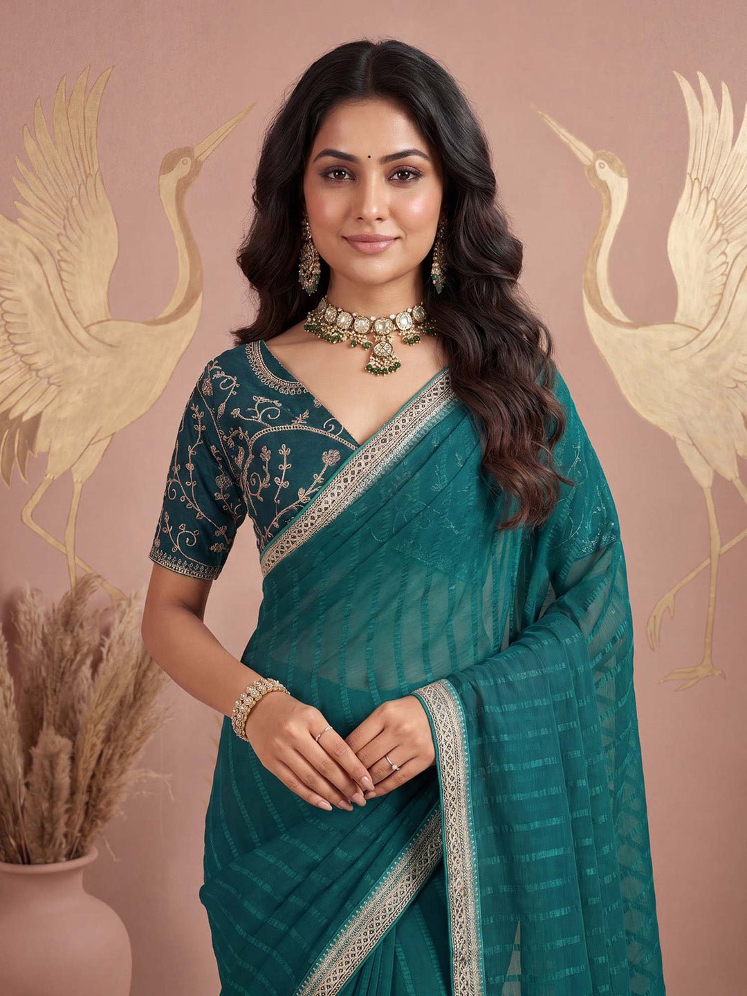 Teal green chiffon with embilleshed work - Ressa