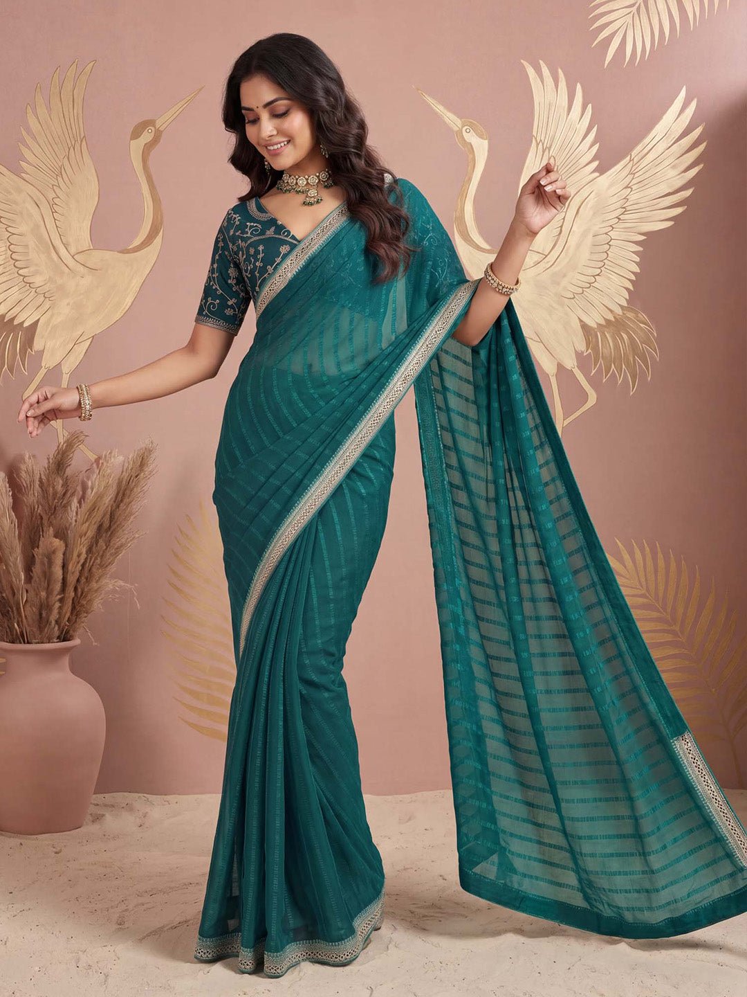 Teal green chiffon with embilleshed work - Ressa
