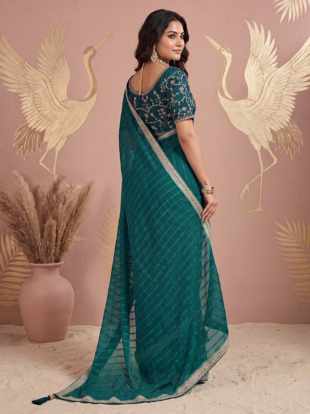 Teal green chiffon with embilleshed work - Ressa