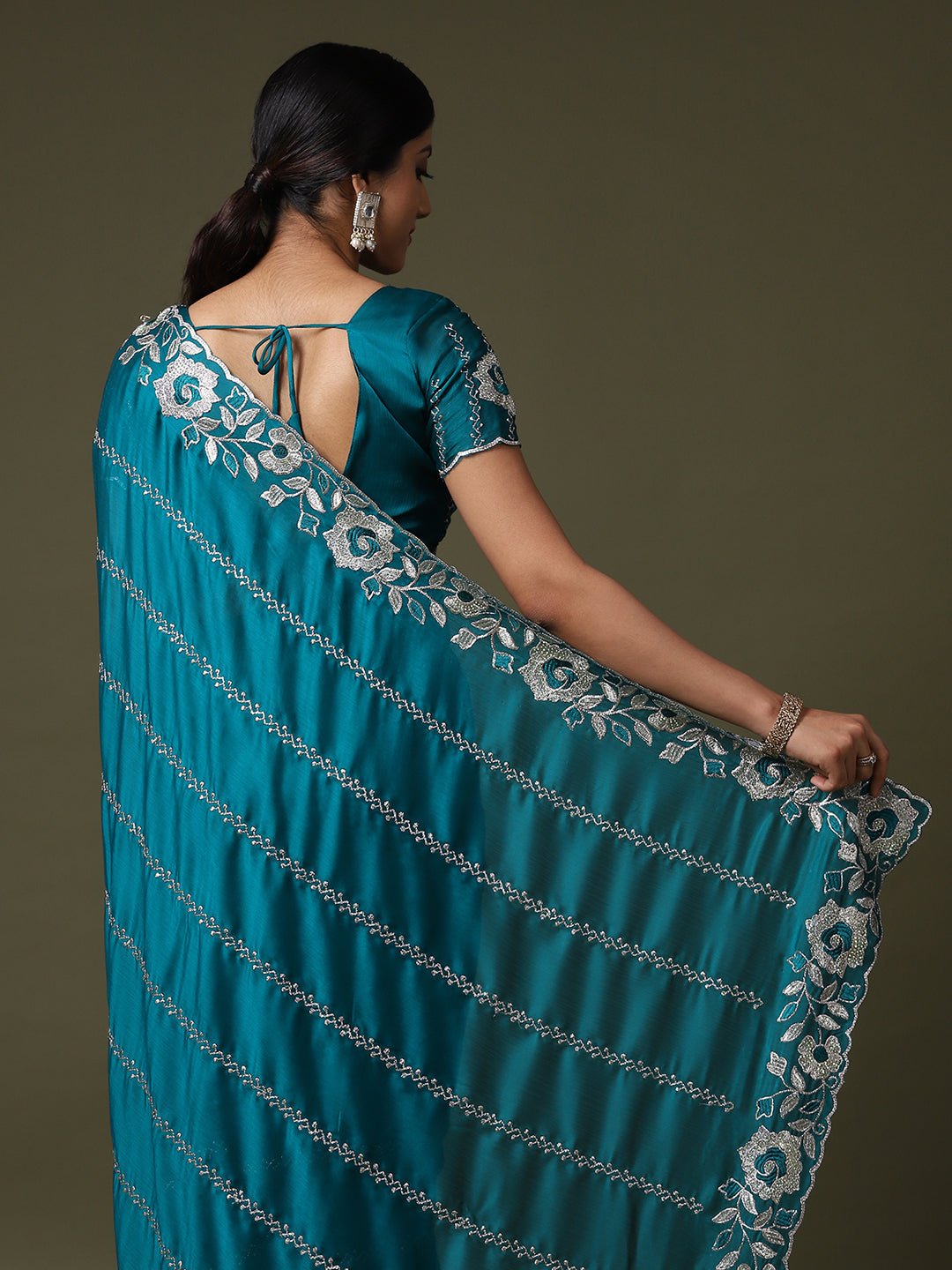 Teal green Georgette Embroidered Saree - Ressa