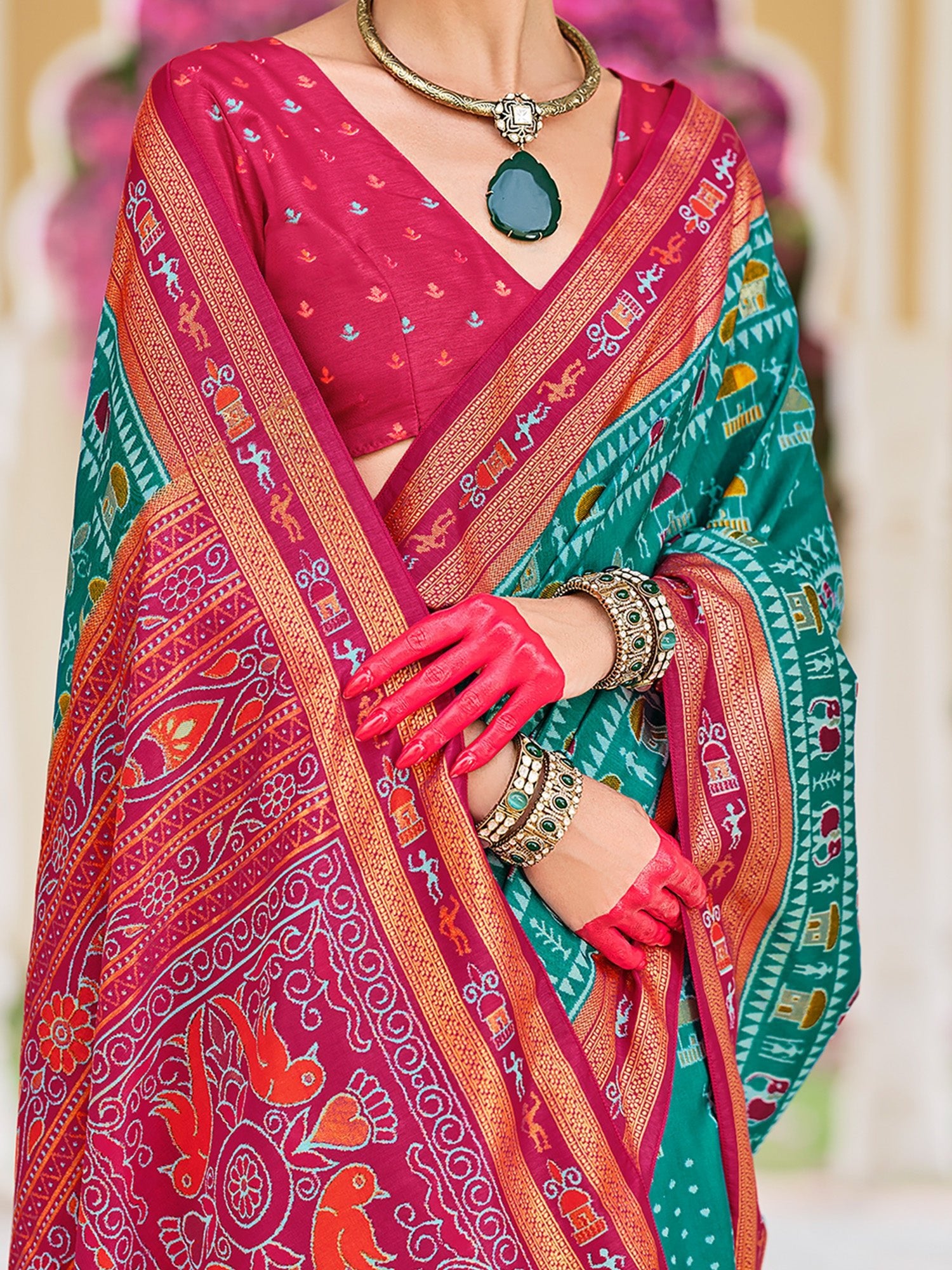 Teal Green Patola Silk Ikat Printed Contrast Pink Border saree - Ressa