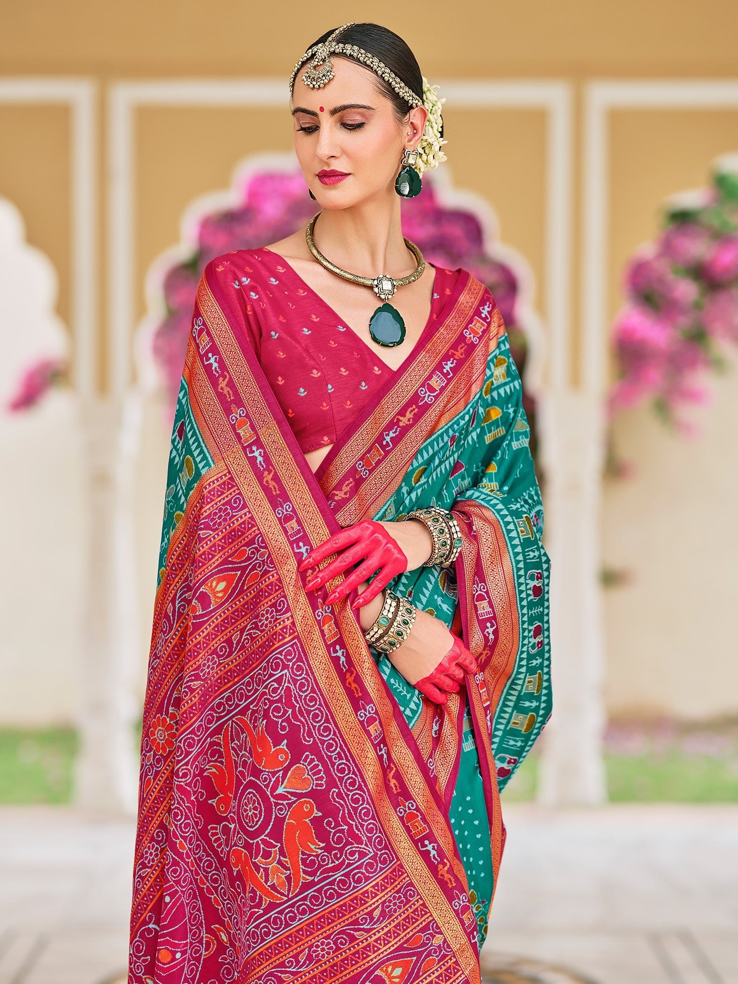 Teal Green Patola Silk Ikat Printed Contrast Pink Border saree - Ressa