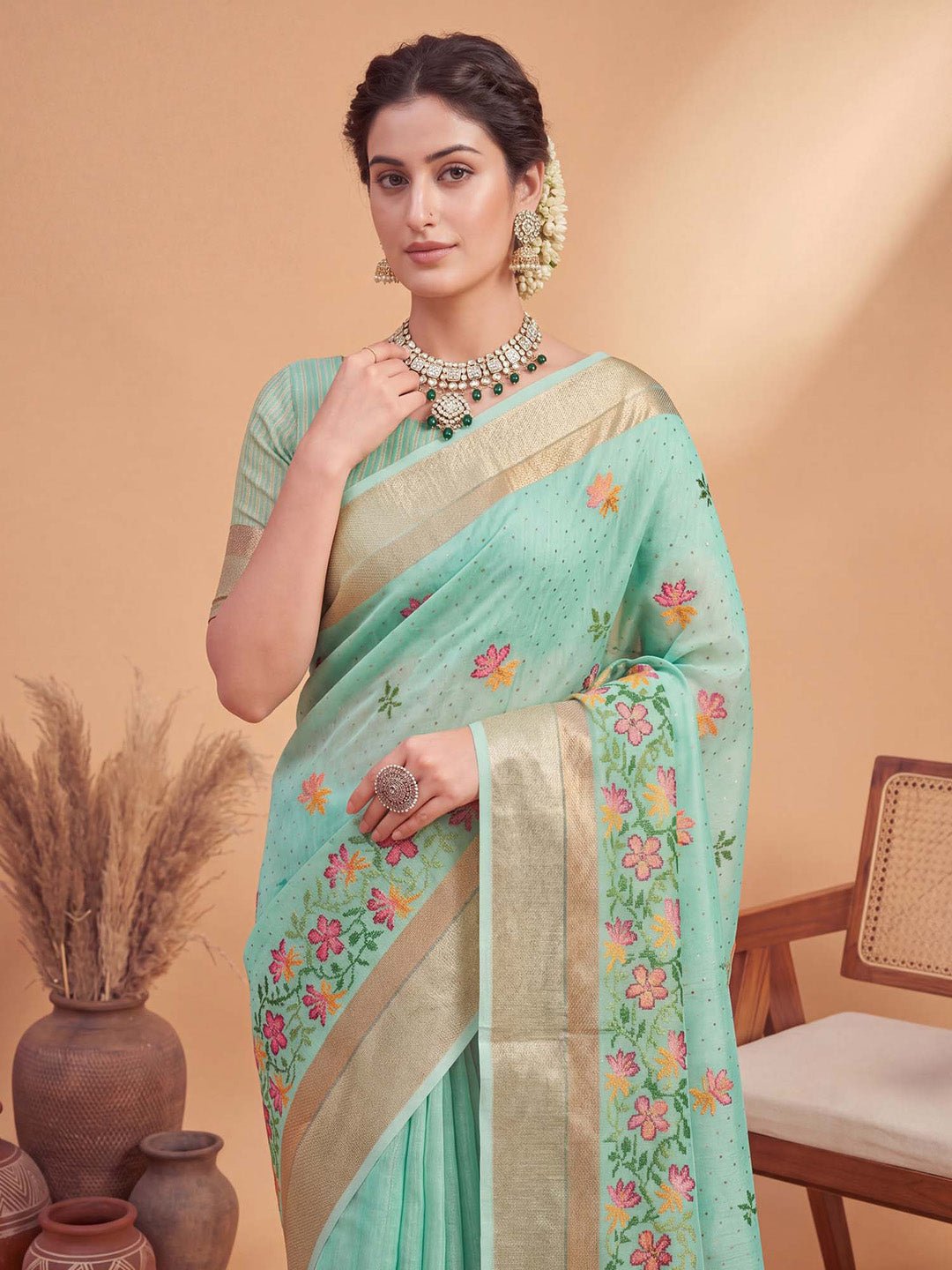 Turquoise linen with woven design saree - Ressa