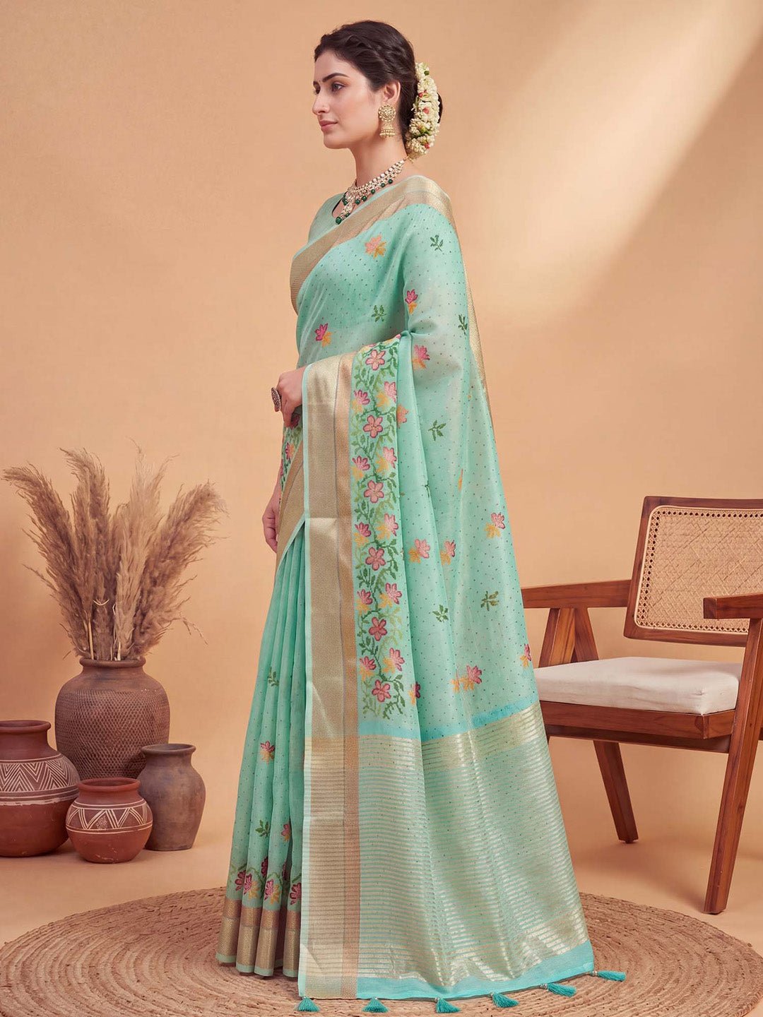 Turquoise linen with woven design saree - Ressa
