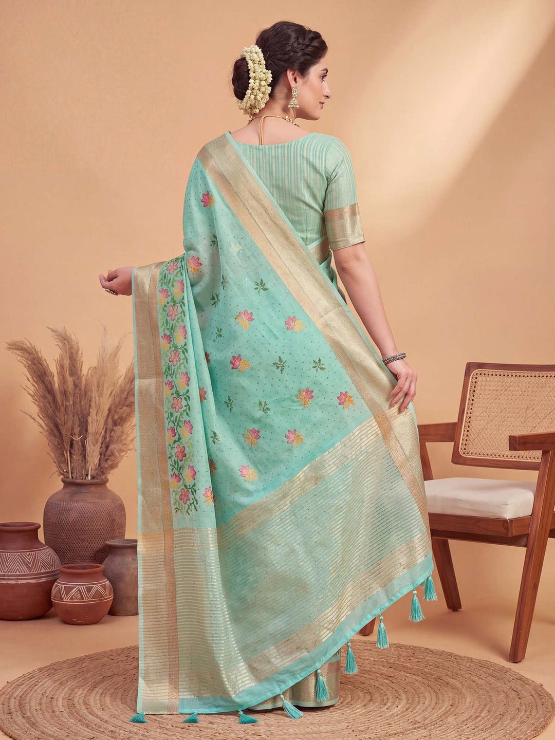 Turquoise linen with woven design saree - Ressa