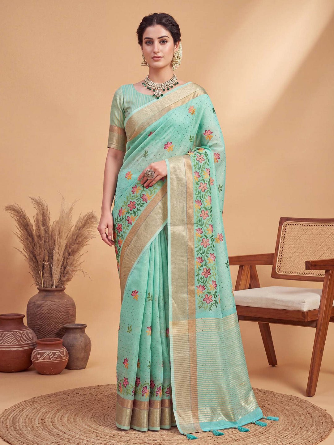 Turquoise linen with woven design saree - Ressa